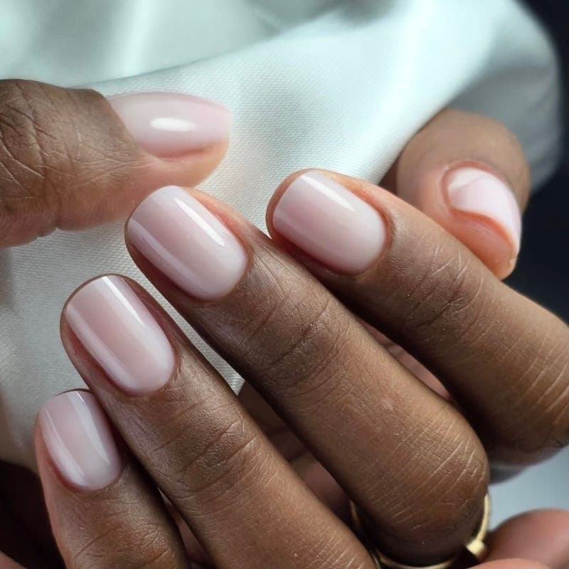 Short nails in a sheer milky nude
